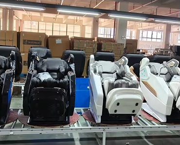 Black and white massage chairs in the workshop